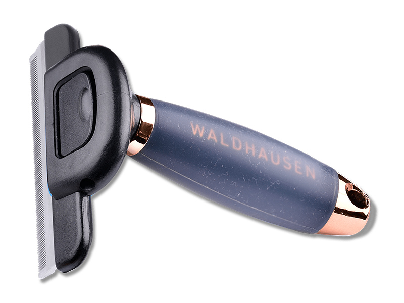 Fellwechselkamm mit blauem Gelgriff